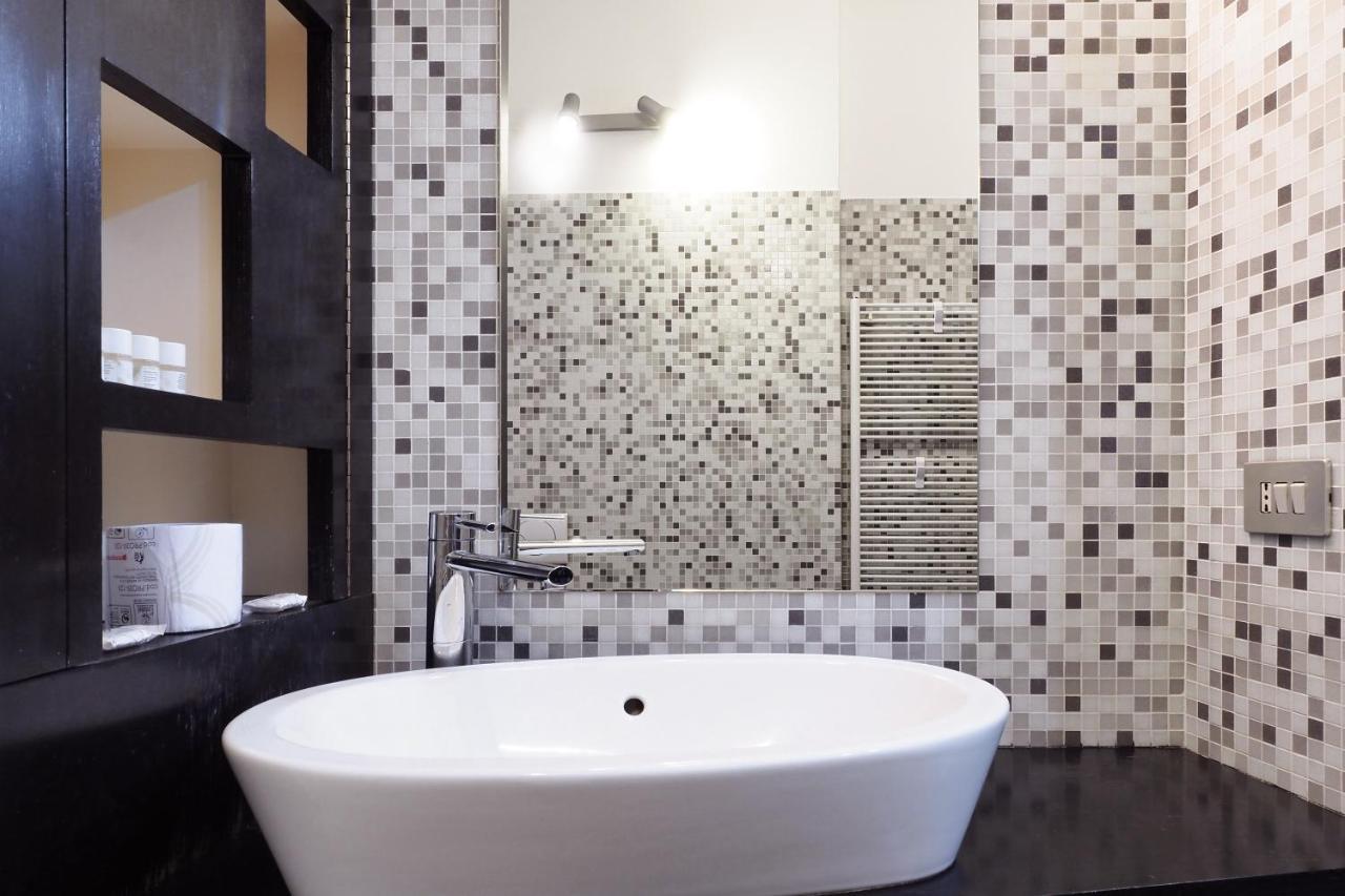 Mila Apartments Alessi ميلان المظهر الخارجي الصورة